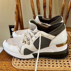 Michael Kors. Gently worn wedge tennis shoes